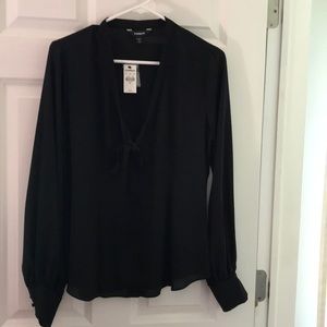 NWT. Black sheer long sleeve blouse.